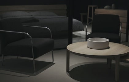 Image of a dark-colored room with furniture
